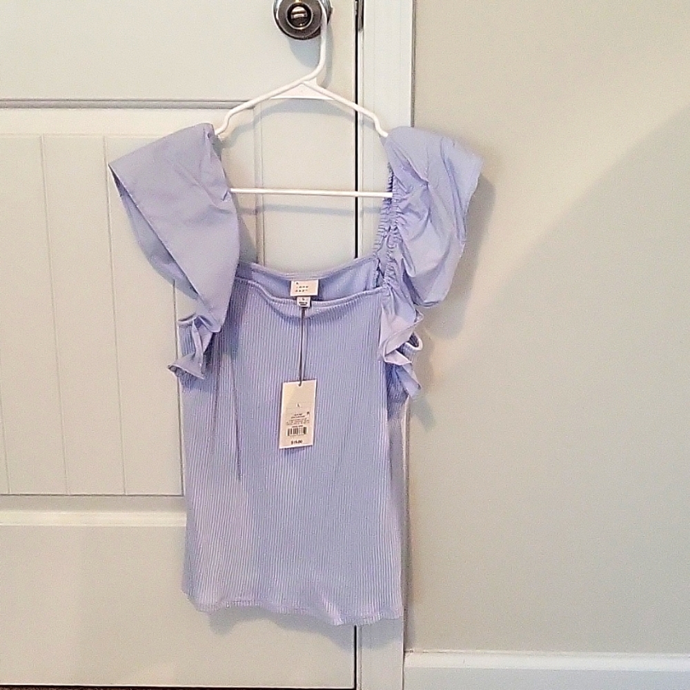 Top with ruffled sleeves